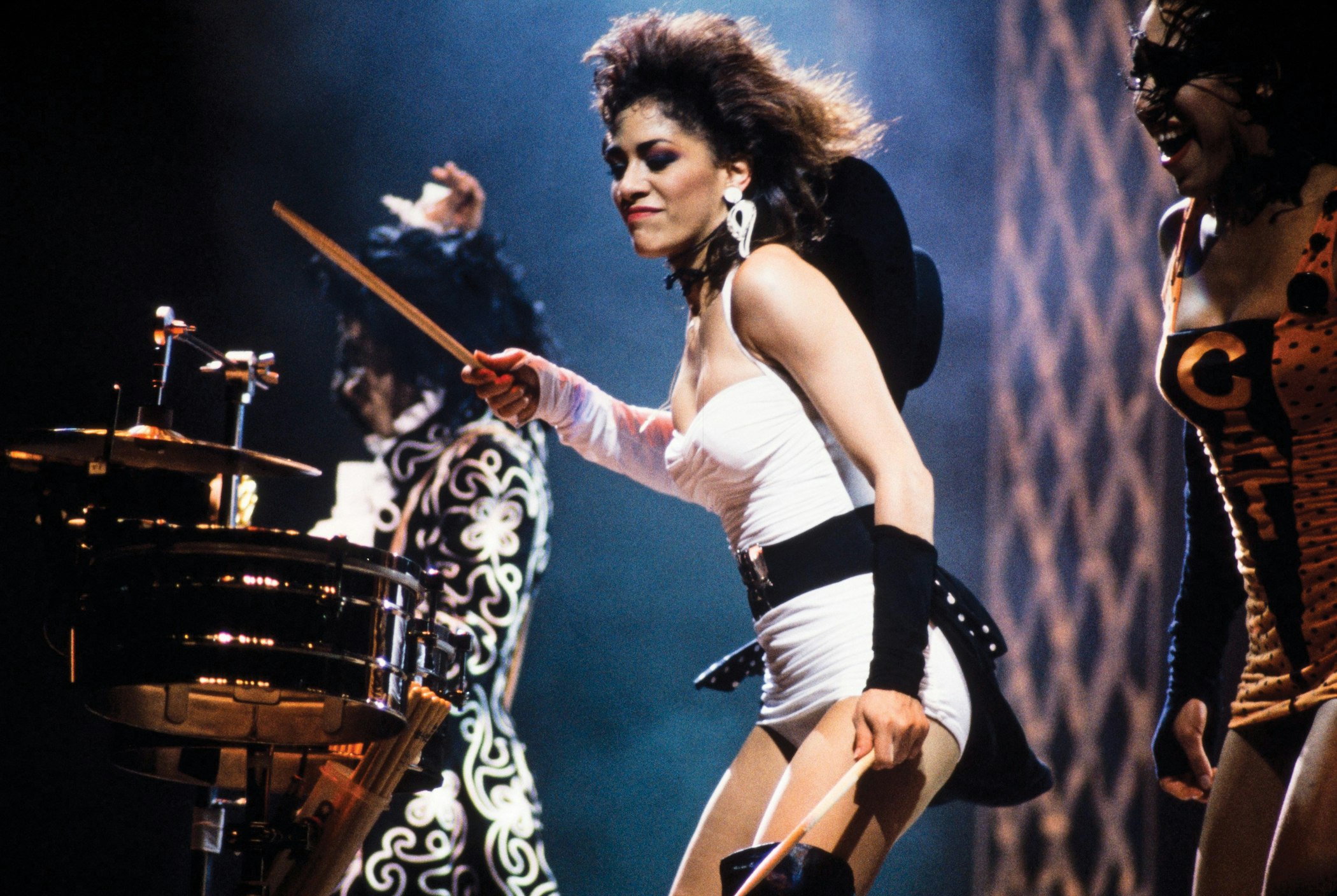 Prince (background), Sheila E., and Cat during a Lovesexy ’88 concert on July 28, 1988, in London, England. Photo by FG/Bauer-Griffin/Getty Images.